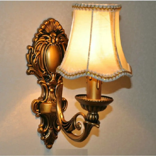 Bronze wall light with vintage cloth lampshade